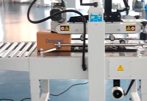 selladora de cajas 6050 en acción